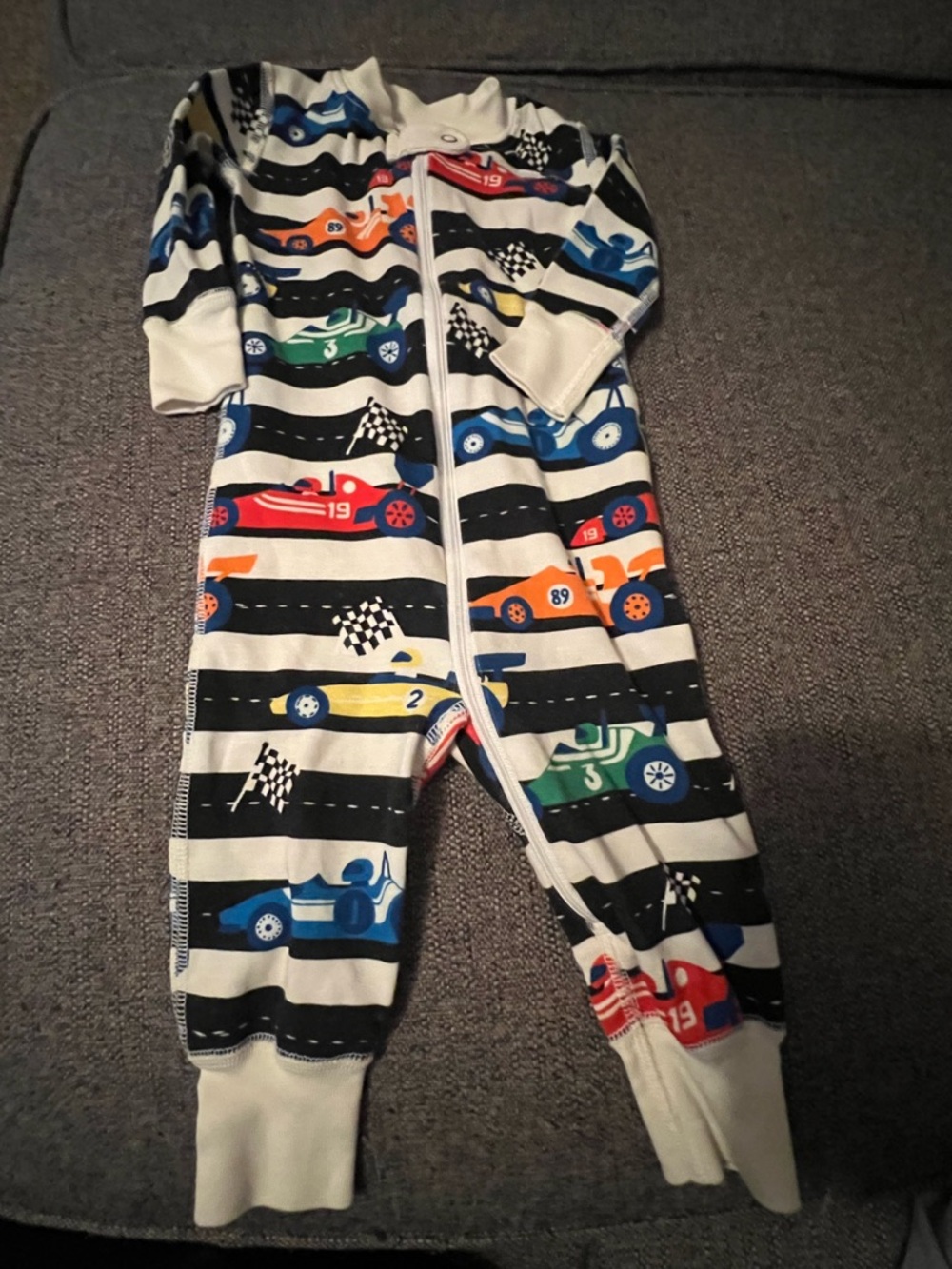 Hanna Andersson Black & White Striped One-Piece with Multicolor Racing Cars